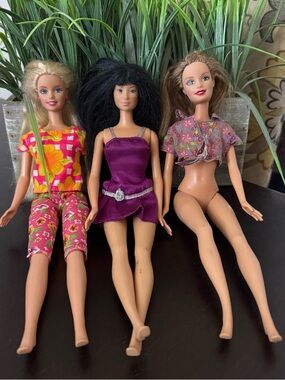 Lot of 3 Fashion Dolls with Colorful Outfits - Pink, Purple, Floral